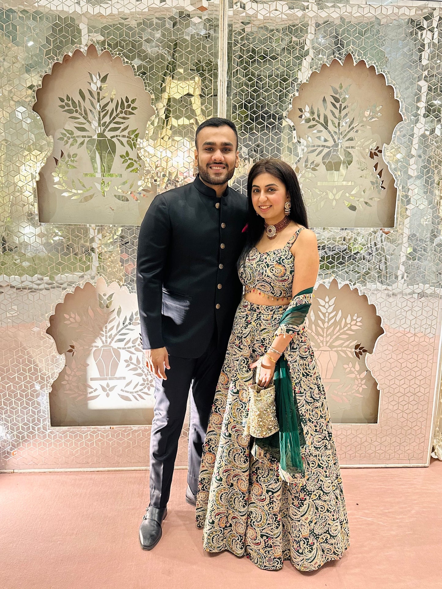 NIKITA KHURANA IN GREEN MULTI COLOR EMBROIDERED LEHENGA SET