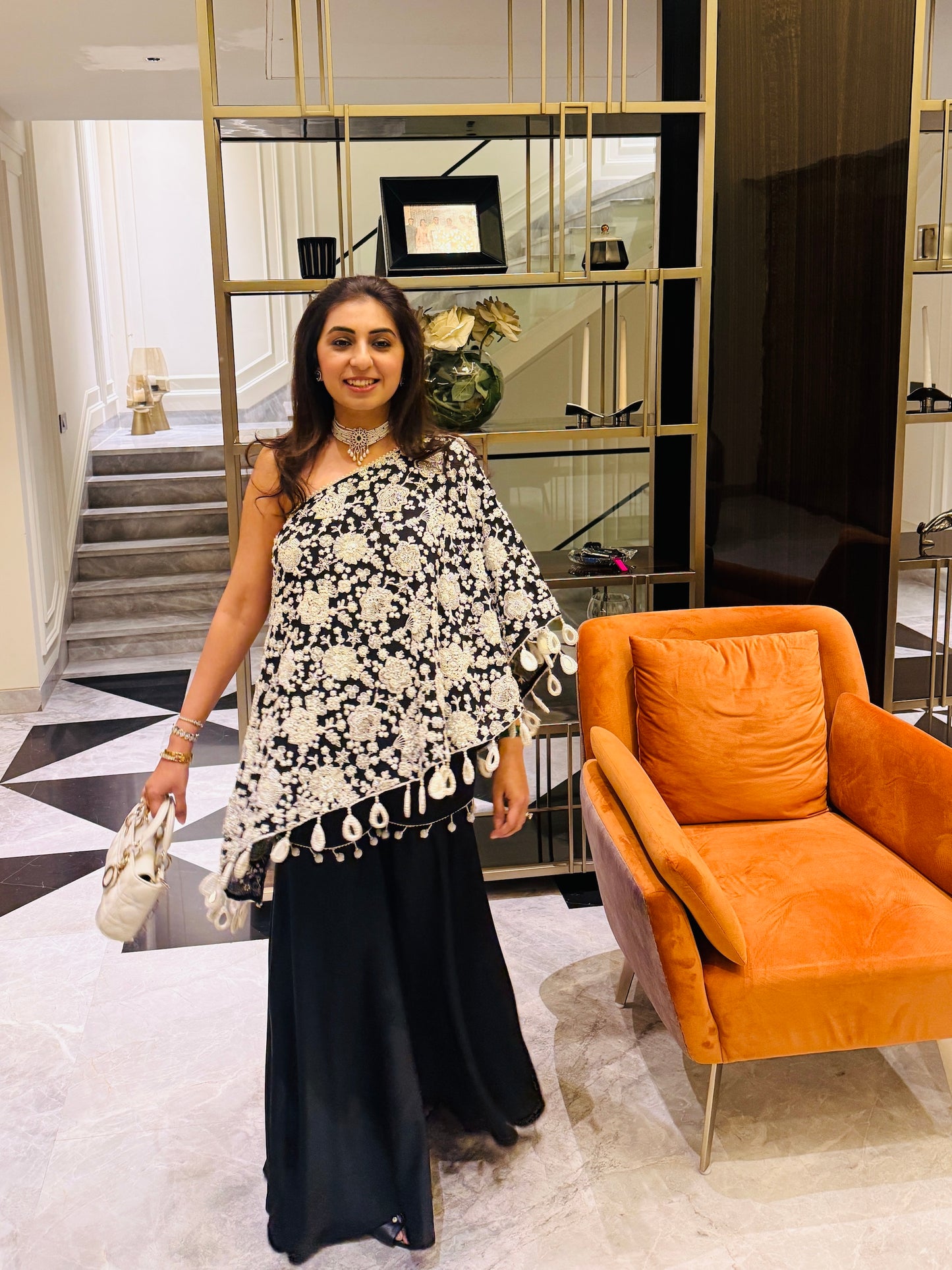NIKITA KHURANA IN BLACK PEARL WORK OFF SHOULDER CAPE SET