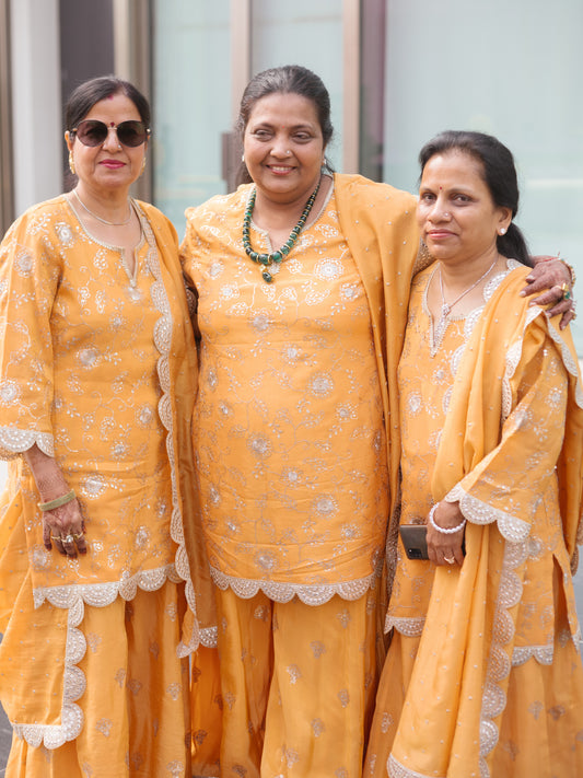 FAMILY IN ORANGE TISSUE SHARARA SET