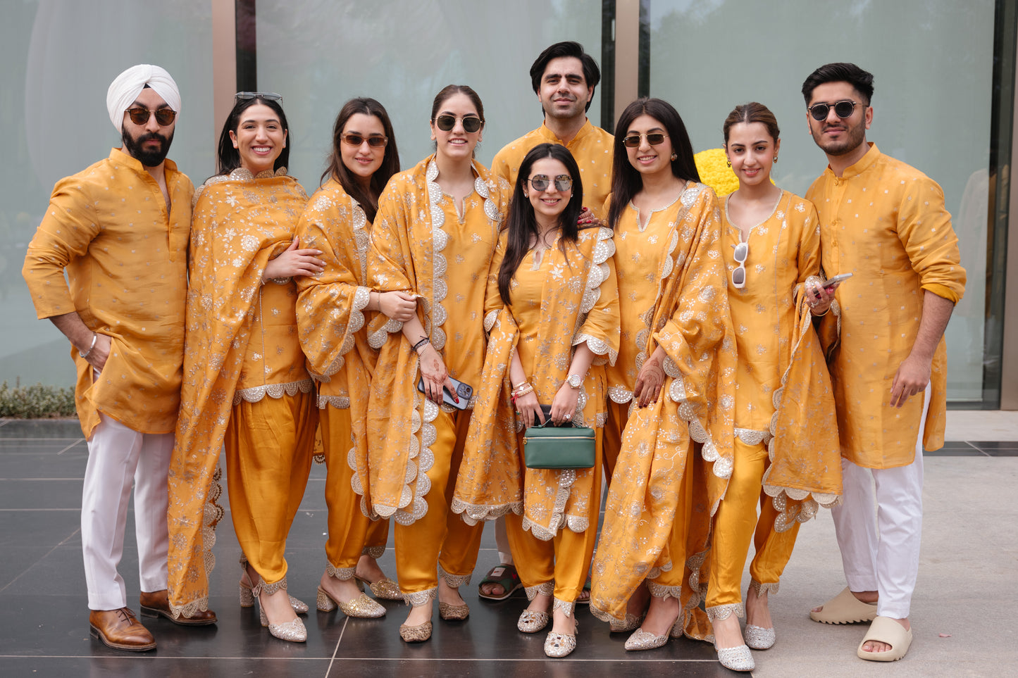 BRIDESMAIDS IN ORANGE TISSUE DHOTI SET