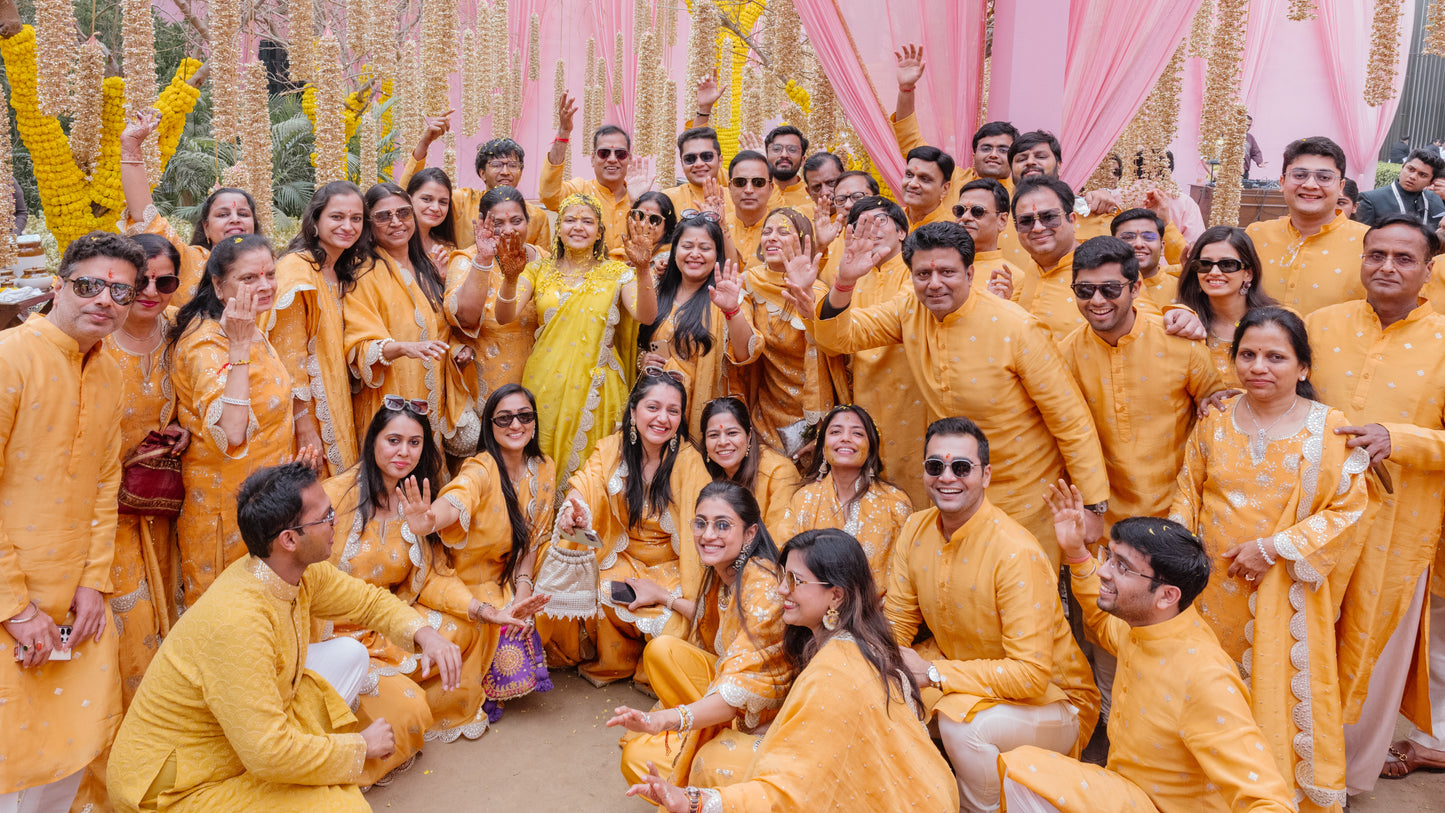 FAMILY IN ORANGE TISSUE SHARARA SET
