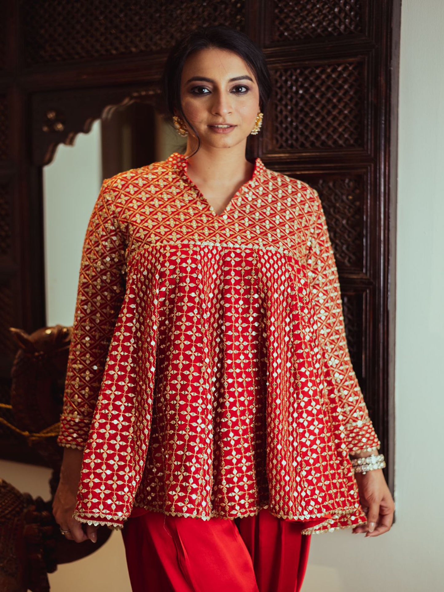 RASNA BHASIN IN RED ZARI & SEQUIN DHOTI SET